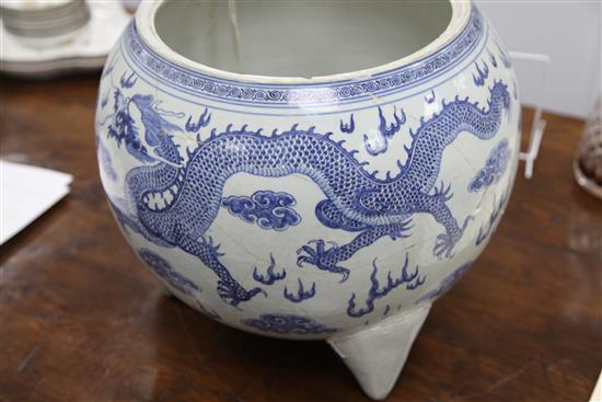 A massive Chinese blue and white dragon tripod censer, Qianlong mark and of the period (1736-95)